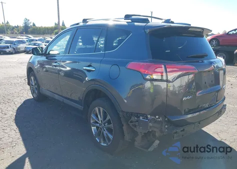 2018 Toyota Rav4 Limited z USA, uszkodzony, nr VIN JTMDFREV4JJ252211
